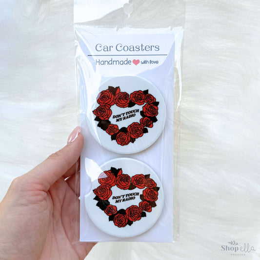 a package of two red roses in the shape of a heart