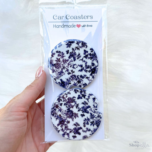a package of two blue and white buttons