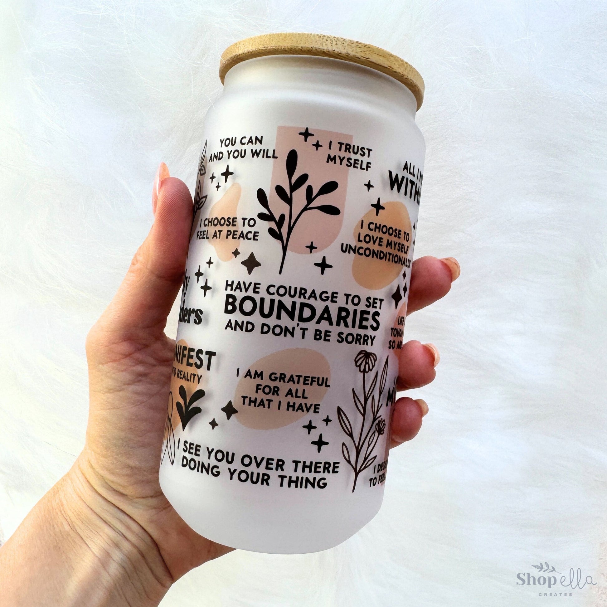 a hand holding a can of coffee that says, i have courage to boundaries and